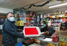 Calbuco: con desechos de la industria salmonera construyen pediluvios sanitarios para calzado